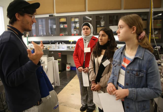 Students in lab discussion